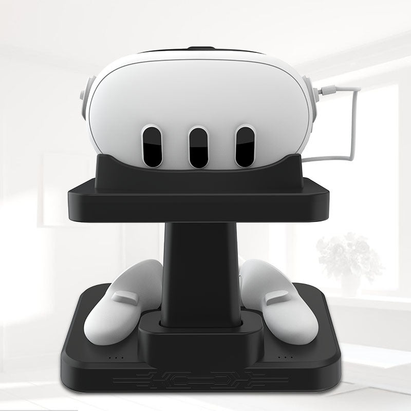 Front view of VR headset and controller dock with a black base and white devices